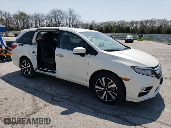 2019 Honda Odyssey Elite with VIN 5FNRL6H94KB067337, listed as a Copart auction lot 52540835 with 69,727 mi miles and Salvage Title. Bid and sale history available at DreamBid. Image 4.