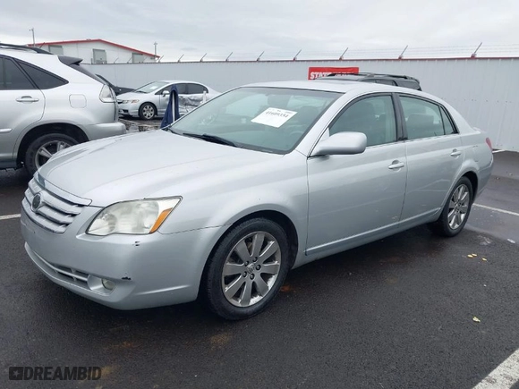 2005 Toyota Avalon XL with VIN 4T1BK36B85U027746, listed as a IAAI auction lot 41609354 with 183,844 mi miles. Bid and sale history available at carsss.com. Image 2.