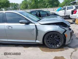 2023 Cadillac CT5 Sport z VIN 1G6DP5RK7P0113696, wystawiony jako IAAI lot #41904906 z przebiegiem 89 191 mil mil oraz . Historia ofert i sprzedaży dostępna na DreamBid. Obrazek 18.
