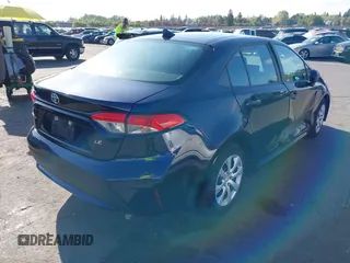 2021 Toyota Corolla LE with VIN 5YFEPMAE4MP210485, listed as a IAAI auction lot 42096039 with 50,398 mi miles. Bid and sale history available at carsss.com. Image 4.