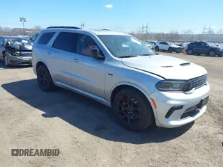 2023 Dodge Durango SRT 392 Premium with VIN 1C4SDJGJXPC636631, listed as a IAAI auction lot 41889533 with 14,789 mi miles and . Bid and sale history available at DreamBid. Image 1.