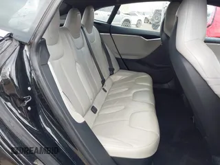 2016 Tesla Model S 70 with VIN 5YJSA1E11GF124965, listed as a IAAI auction lot 41458132 with Not provided miles and . Bid and sale history available at DreamBid. Image 8.