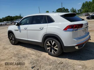 2023 Volkswagen Atlas SE with VIN 1V2DC2CA4PC214280, listed as a Copart auction lot 55832815 with 28,163 mi miles and Salvage title. Bid and sale history available at DreamBid. Image 2.