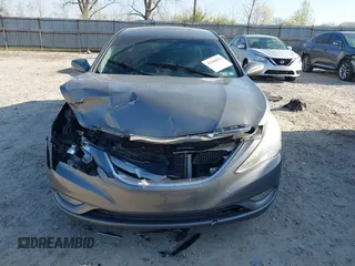 2013 Hyundai Sonata Limited with VIN 5NPEC4AB1DH585765, listed as a IAAI auction lot 42000032 with 179,490 mi miles and . Bid and sale history available at DreamBid. Image 12.