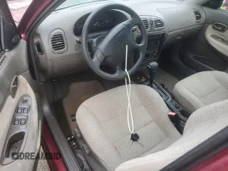 1999 Daewoo Nubira CDX z VIN KLAJB52Z5XK256700, wystawiony jako Copart lot #75085934 z przebiegiem Nie podano mil oraz Szkody całkowita. Historia ofert i sprzedaży dostępna na DreamBid. Obrazek 8.
