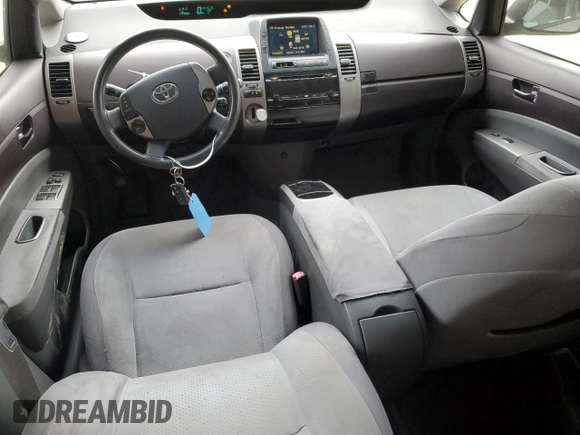 2005 Toyota Prius z VIN JTDKB20U557029770, wystawiony jako Copart lot #59997865 z przebiegiem 237 030 mil mil oraz Szkoda całkowita • Salvage title. Historia ofert i sprzedaży dostępna na DreamBid. Obrazek 8.