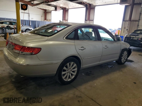 2010 Hyundai Azera GLS with VIN KMHFC4DD7AA473519, listed as a Copart auction lot 71422234 with 120,080 mi miles and Salvage title. Bid and sale history available at DreamBid. Image 3.