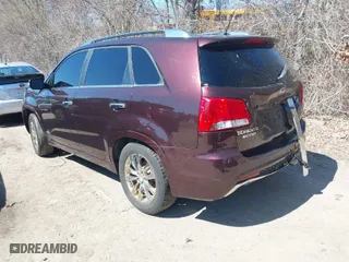 2011 Kia Sorento SX with VIN 5XYKWDA28BG122133, listed as a IAAI auction lot 41973379 with 185,627 mi miles. Bid and sale history available at carsss.com. Image 3.
