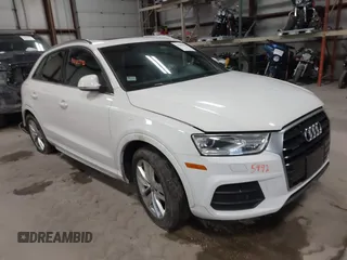 2016 Audi Q3 Premium Plus with VIN WA1EFCFS8GR012119, listed as a IAAI auction lot 41285992 with 96,693 mi miles. Bid and sale history available at carsss.com. Image 1.