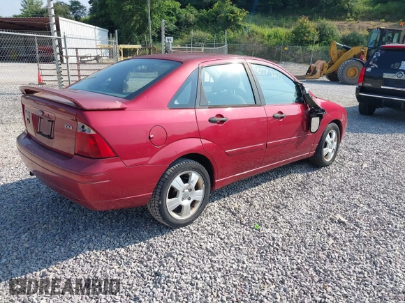 2005 Ford Focus S with VIN 1FAFP34N65W272608, listed as a IAAI auction lot 42573272 with 132,102 mi miles and . Bid and sale history available at DreamBid. Image 4.