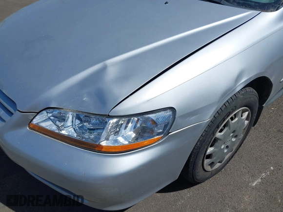 2002 Honda Accord LX with VIN 1HGCG56422A167829, listed as a IAAI auction lot 42401497 with 221,550 mi miles and . Bid and sale history available at DreamBid. Image 6.