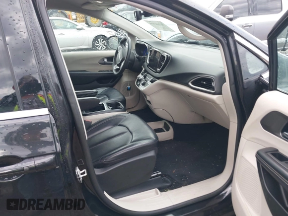 2022 Chrysler Pacifica Touring L with VIN 2C4RC1BG9NR194782, listed as a IAAI auction lot 41842410 with 76,231 mi miles and . Bid and sale history available at DreamBid. Image 5.