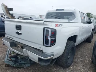 2018 Chevrolet Silverado 1500 LT with VIN 3GCUKREC9JG453405, listed as a IAAI auction lot 41580161 with 172,578 mi miles. Bid and sale history available at carsss.com. Image 4.