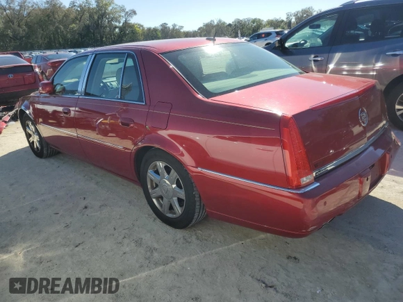 2007 Cadillac DTS V8 z VIN 1G6KD57Y67U181293, wystawiony jako Copart lot #48122555 z przebiegiem 137 962 mil mil oraz Szkody całkowita. Historia ofert i sprzedaży dostępna na DreamBid. Obrazek 2.