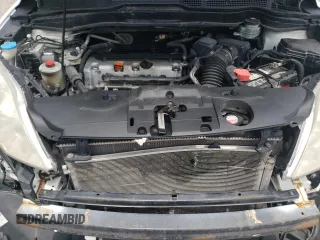 2010 Honda CR-V LX with VIN 3CZRE3H35AG705585, listed as a Copart auction lot 60032855 with 115,136 mi miles and Salvage title. Bid and sale history available at DreamBid. Image 11.