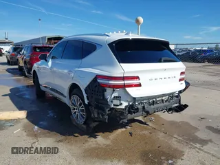 2023 Genesis GV80 with VIN KMUHBDSB0PU140228, listed as a IAAI auction lot 41253270 with 33,467 mi miles and . Bid and sale history available at DreamBid. Image 3.