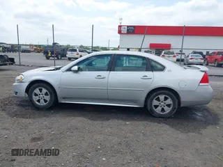 2009 Chevrolet Impala LT with VIN 2G1WT57K991228661, listed as a IAAI auction lot 42001074 with 104,918 mi miles and . Bid and sale history available at DreamBid. Image 14.