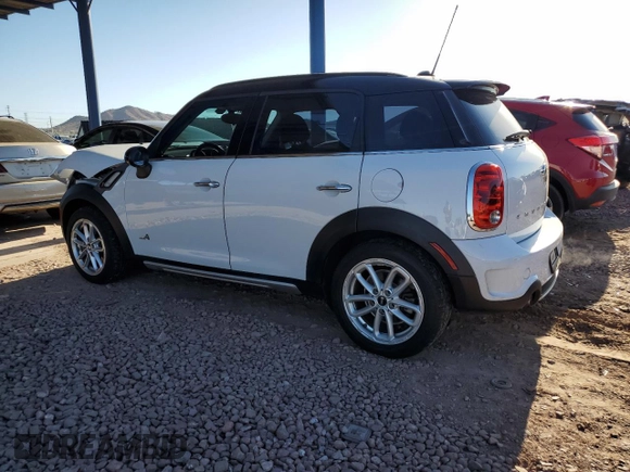 2015 MINI Countryman S with VIN WMWZC5C53FWP44388, listed as a Copart auction lot 54560585 with 67,913 mi miles and Salvage Title. Bid and sale history available at DreamBid. Image 2.