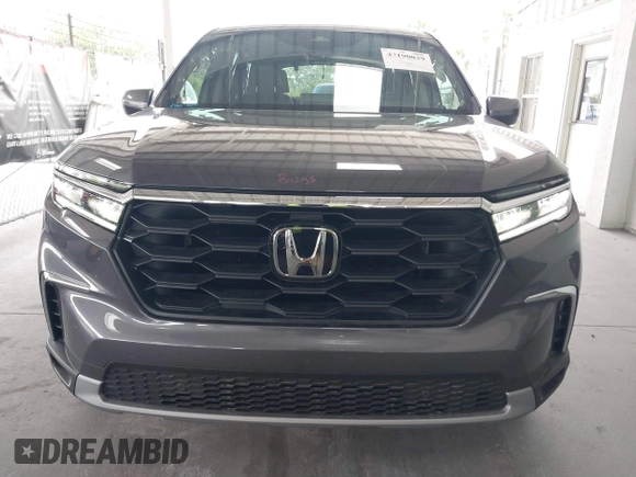 2025 Honda Pilot EX-L z VIN 5FNYG2H40SB019525, wystawiony jako IAAI lot #42190029 z przebiegiem 10 794 mil mil oraz . Historia ofert i sprzedaży dostępna na DreamBid. Obrazek 13.