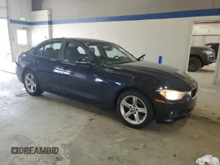 2014 BMW 3 Series 328i xDrive with VIN WBA3B5C50EP539998, listed as a Copart auction lot 57281255 with 146,476 mi miles and Salvage title. Bid and sale history available at DreamBid. Image 4.