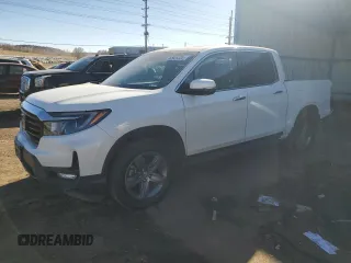 2022 Honda Ridgeline RTL-E with VIN 5FPYK3F76NB034284, listed as a Copart auction lot 42906585 with 33,316 mi miles and Salvage Title. Bid and sale history available at DreamBid. Image 1.