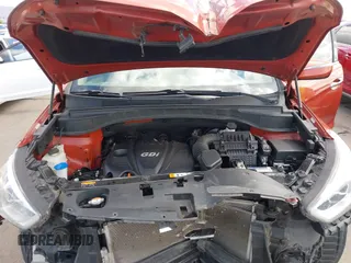 2014 Hyundai Santa Fe z VIN 5XYZUDLB4EG138898, wystawiony jako IAAI lot #42196491 z przebiegiem Nie podano mil oraz . Historia ofert i sprzedaży dostępna na DreamBid. Obrazek 10.
