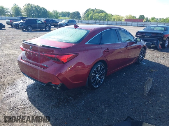 2019 Toyota Avalon XLE with VIN 4T1BZ1FB6KU013498, listed as a IAAI auction lot 42085943 with 61,851 mi miles. Bid and sale history available at carsss.com. Image 4.