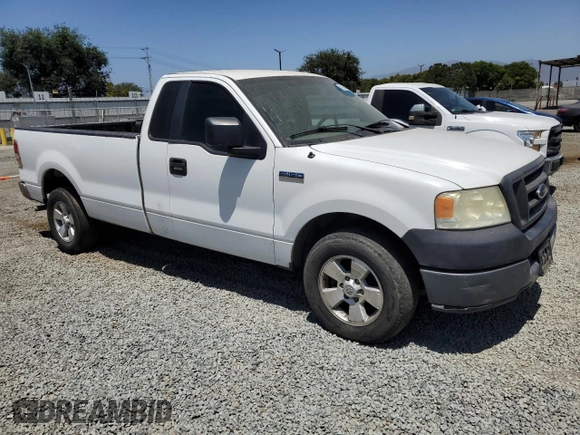 2005 Ford F-150 XL with VIN 1FTRF12255NB53669, listed as a Copart auction lot 61636135 with 156,562 mi miles and Salvage title. Bid and sale history available at DreamBid. Image 4.