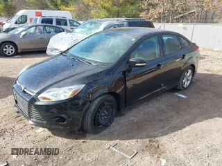 2013 Ford Focus SE z VIN 1FADP3F28DL312357, wystawiony jako IAAI lot #41798311 z przebiegiem 98 280 mil mil oraz . Historia ofert i sprzedaży dostępna na DreamBid. Obrazek 2.
