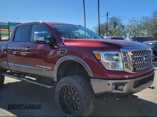 2017 Nissan Titan Pro-4X z VIN 1N6BA1F44HN548942, wystawiony jako IAAI lot #41851760 z przebiegiem 90 242 mil mil oraz . Historia ofert i sprzedaży dostępna na DreamBid. Obrazek 1.