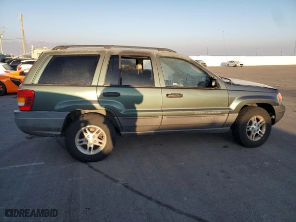 2002 Jeep Grand Cherokee Laredo with VIN 1J4GW48N72C155063, listed as a Copart auction lot 82839234 with 165,397 mi miles and Clean Title. Bid and sale history available at carsss.com. Image 3.