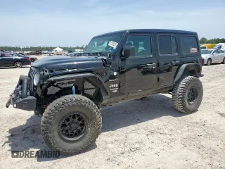 2020 Jeep Wrangler Unlimited Sahara Altitude with VIN 1C4HJXENXLW157131, listed as a Copart auction lot 57039315 with 51,104 mi miles and Salvage title. Bid and sale history available at DreamBid. Image 1.