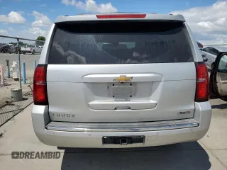 2017 Chevrolet Tahoe Premier with VIN 1GNSCCKC5HR212660, listed as a Copart auction lot 56337065 with 135,989 mi miles and Salvage title. Bid and sale history available at DreamBid. Image 6.