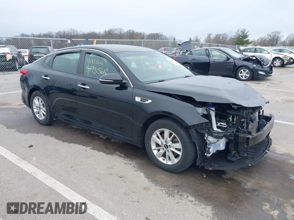 2018 Kia Optima LX with VIN 5XXGT4L33JG240159, listed as a IAAI auction lot 41935612 with 58,756 mi miles and . Bid and sale history available at carsss.com. Image 1.