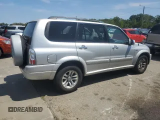 2004 Suzuki XL7 LX z VIN JS3TX92V644109794, wystawiony jako Copart lot #68244184 z przebiegiem 107 769 mil mil oraz Szkoda całkowita • Salvage title. Historia ofert i sprzedaży dostępna na DreamBid. Obrazek 3.