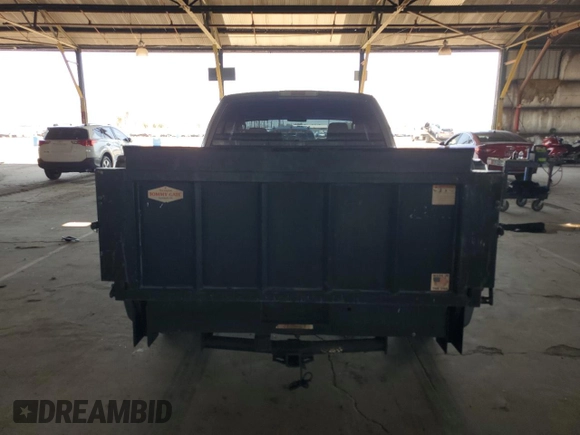 2005 Ford F-150 STX with VIN 1FTRX12W25NA37703, listed as a Copart auction lot 60089325 with 128,651 mi miles and Salvage title. Bid and sale history available at DreamBid. Image 6.