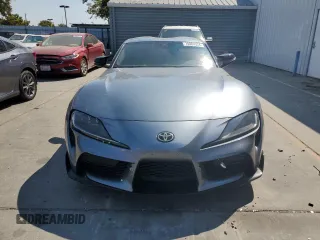 2021 Toyota GR Supra 3.0 with VIN WZ1DB0C01MW042477, listed as a Copart auction lot 70084924 with 59,925 mi miles and Salvage Title. Bid and sale history available at carsss.com. Image 5.