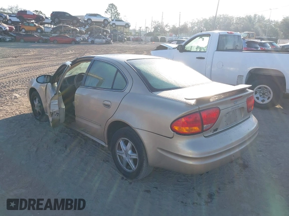 2004 Oldsmobile Alero GL1 z VIN 1G3NL52E34C191243, wystawiony jako IAAI lot #41536825 z przebiegiem 117 998 mil mil oraz . Historia ofert i sprzedaży dostępna na DreamBid. Obrazek 3.