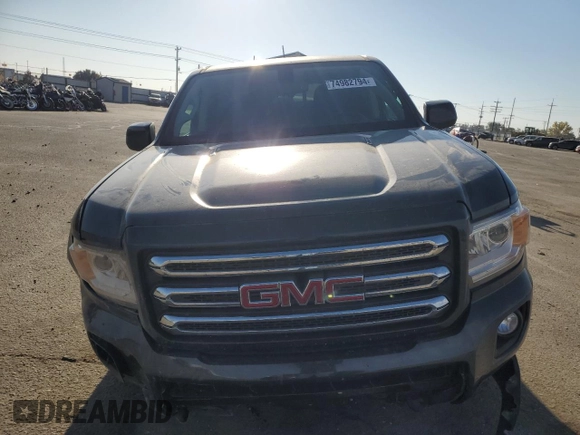 2017 GMC Canyon z VIN 1GTP6CE1XH1252005, wystawiony jako Copart lot #74982794 z przebiegiem 62 797 mil mil oraz Szkoda całkowita • Salvage title. Historia ofert i sprzedaży dostępna na DreamBid. Obrazek 5.