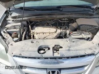 2005 Honda Odyssey TOURING with VIN 5FNRL38895B060605, listed as a IAAI auction lot 41809330 with 228,487 mi miles. Bid and sale history available at carsss.com. Image 10.