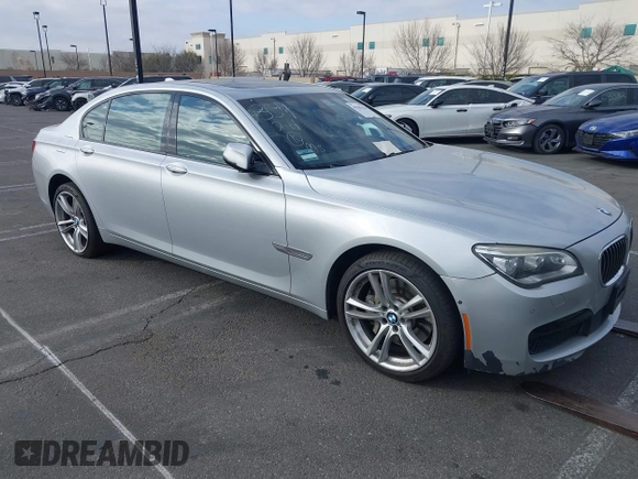 2015 BMW 7 Series 750Li with VIN WBAYE8C5XFD782039, listed as a IAAI auction lot 41505626 with 74,716 mi miles. Bid and sale history available at carsss.com. Image 1.