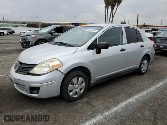 2009 Nissan Versa 1.6 with VIN 3N1CC11E79L429613, listed as a Copart auction lot 72220034 with 134,891 mi miles and Salvage Title. Bid and sale history available at carsss.com. Image 1.