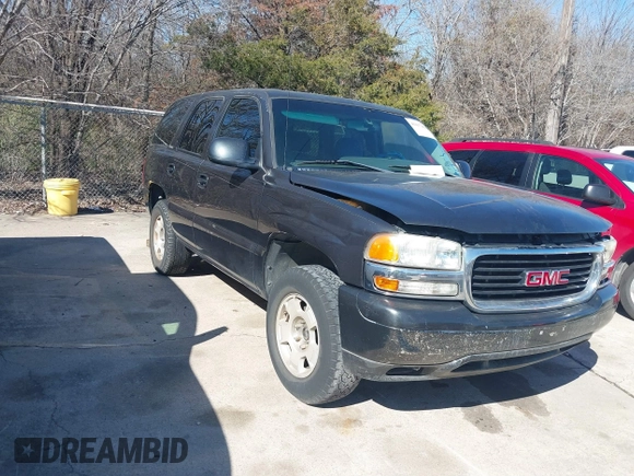2003 GMC Yukon SLT with VIN 1GKEC13V23R135379, listed as a IAAI auction lot 41637458 with 236,134 mi miles. Bid and sale history available at carsss.com. Image 1.