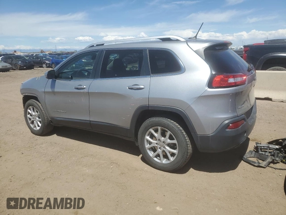 2015 Jeep Cherokee Latitude with VIN 1C4PJMCB6FW734003, listed as a Copart auction lot 54659085 with 146,379 mi miles and Salvage Title. Bid and sale history available at DreamBid. Image 2.