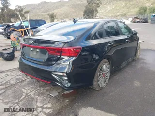 2021 Kia Forte GT with VIN 3KPF44AC9ME369516, listed as a IAAI auction lot 41690655 with 65,149 mi miles. Bid and sale history available at carsss.com. Image 4.