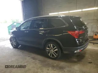 2017 Honda Pilot Touring z VIN 5FNYF6H91HB011030, wystawiony jako Copart lot #60236875 z przebiegiem 119 909 mil mil oraz Szkoda całkowita • Salvage title. Historia ofert i sprzedaży dostępna na DreamBid. Obrazek 2.