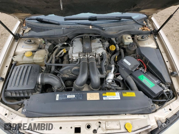 1998 Cadillac Catera z VIN W06VR52R5WR028774, wystawiony jako Copart lot #78085484 z przebiegiem 104 609 mil mil oraz Szkoda całkowita • Salvage title. Historia ofert i sprzedaży dostępna na DreamBid. Obrazek 12.