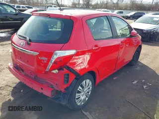 2013 Toyota Yaris L with VIN JTDKTUD35DD560686, listed as a IAAI auction lot 41702208 with 142,174 mi miles. Bid and sale history available at carsss.com. Image 4.