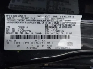 2013 Ford Focus SE z VIN 1FADP3F27DL342384, wystawiony jako IAAI lot #41474290 z przebiegiem 125 664 mil mil oraz . Historia ofert i sprzedaży dostępna na DreamBid. Obrazek 9.