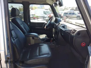 2002 Mercedes-Benz G-Class with VIN WDCYR49E02X129195, listed as a IAAI auction lot 41871996 with 200,945 mi miles. Bid and sale history available at carsss.com. Image 5.